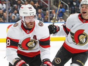 Claude Giroux (left) of the Ottawa Senators celebrates a goal against the Toronto Maple Leafs during an NHL game at Scotiabank Arena on October 15, 2022 in Toronto, Ontario, Canada. The Maple Leafs defeated the Senators 3-2.