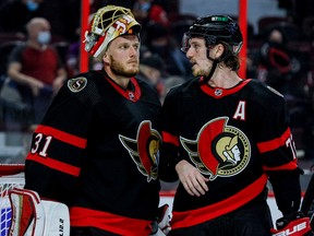 Thomas Chabot, seen with goaltender Anton Forsberg, says now it's about going to work as the regular season begins. "Throughout the summer, everybody was happy when we were adding those pieces, but at the same time the new guys have come in and they've just fit right in. They love having fun, but when we hit the ice it's all business."