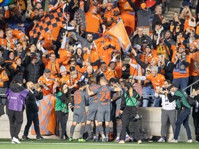 Forge FC celebrate goal in front of their fans in the first half against Atletico Ottawa.
