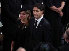 Prime Minister Justin Trudeau and his wife Sophie Gregoire Trudeau attend the State Funeral Service for Britain's Queen Elizabeth II at Westminster Abbey in London on Sept. 19, 2022.