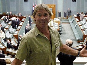 Australian television personality Steve Irwin wearing his trademark shorts arrives to hear the speech by U.S. President George W Bush to the Australian national parliament in Canberra 23 October 2003.