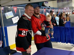 Former Senators winger Chris Neil embraces Hockeyville celebrations with Nick Rideout and 10-month-old son.