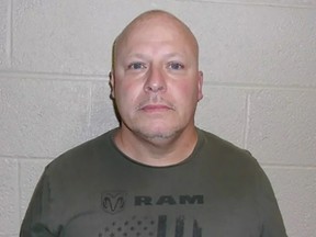 Mugshot of David Lowe, accused of groping his stepdaughter while she was attending online class.