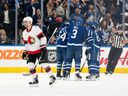 Maple Leafs center David Kampf (64) celebrates with his teammates after scoring a goal against the Senators in the second period.