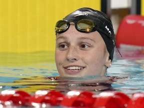 Summer McIntosh of Canada smiles after winning the gold medal in the Women's 200 metre individual medley final during the swimming competition of the Commonwealth Games, at the Sandwell Aquatics Centre in Birmingham, England, Monday, Aug. 1, 2022.
