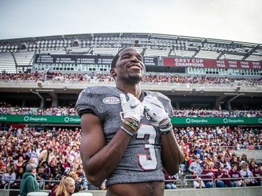 Gee Gees player Willy-Pierre Dimbongi watches the last couple minutes of play in the fourth quarter, savouring his team's big win. 

ASHLEY FRASER, POSTMEDIA