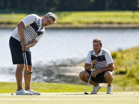 Mitch Dale, left, and Andy Rajhathy take part in the Ottawa Sun Scramble at the Eagle Creek Golf Club in 2019. "Our mission statement has always been to grow golf in Ottawa," said Rajhathy