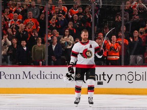 Senators forward Claude Giroux salutes the Philadelphia crowd prior to Saturday's game against the Flyers.