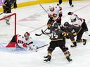 Cam Talbot #33 of the Ottawa Senators makes a save against Michael Amadio #22 of the Vegas Golden Knights during the third period of a game on November 23, 2022 at T-Mobile Arena in Las Vegas, Nevada. 