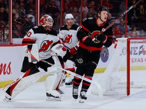 Ottawa Senators left wing Brady Tkachuk (7) and New Jersey Devils goaltender Akira Schmid (40) during first period NHL action at the Canadian Tire Centre on Saturday, Nov. 19, 2022.