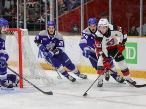 Ottawa 67’s forward Brad Gardiner is chased by Jacob Holmes and Marc Boudreau of the Sudbury Wolves.  Brad was the second 67’s player to earn a Gordie Howe hat trick with a short-handed, empty net goal to put the 67’s up 5-1 over the Sudbury Wolves.