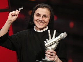 Sister Cristina Scuccia reacts after winning the Italian State RAI TV program's final "The Voice of Italy" in Milan on June 6, 2014. (MARCO BERTORELLO/AFP via Getty Images)