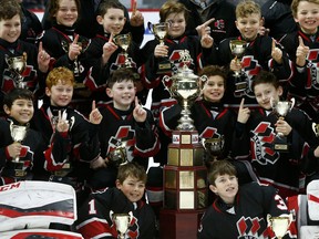Nepean Raiders celebrate their 6-3 championship victory at the 2018 Bell Capital Cup.