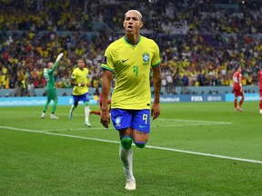 Richarlison of Brazil celebrates after scoring their team's first goal during the FIFA World Cup Qatar 2022 Group G match between Brazil and Serbia at Lusail Stadium on November 24, 2022 in Lusail City, Qatar.