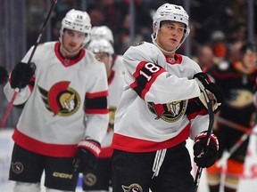 Senators Tim Stutzle (18) celebrates their power play goal against the Ducks in the second period on Friday.
