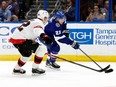 Senators defenceman Nikita Zaitsev pursues Lightning forward Brayden Point during a Nov. 1 game at Tampa, Fla.