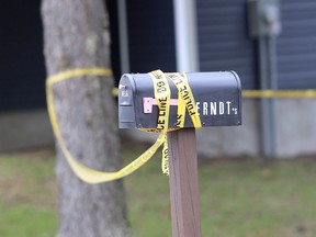 A mailbox outside a home on McKendry Road, just south of Unity Road is covered with yellow police tape after a sudden death took place in a home on Monday November 15,  2022.