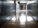 An empty school hallway.