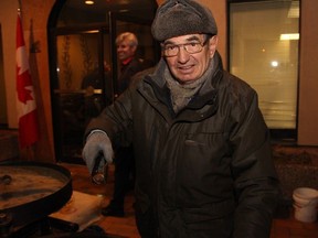File: Luciano Pradal was outside serving roasted chestnuts to guests arriving to the Italian-themed Mangia! Mangia! gala for the Queensway Carleton Hospital, held Saturday, Nov. 8, 2014, at the Sala San Marco.
