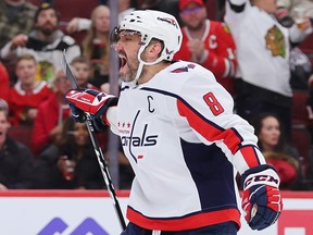 Alex Ovechkin of the Washington Capitals celebrates after scoring his 800th career goal in Chicago on Dec. 13, 2022. He's one behind Gordie Howe heading into Thursday night's game in Ottawa.