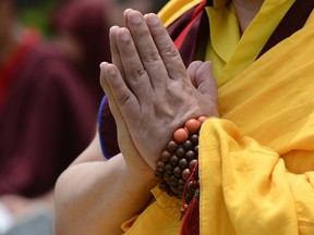 Buddhist monks offer prayers for peace.