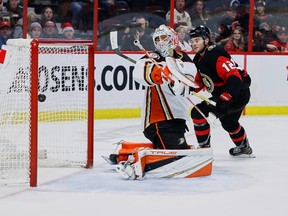 Ottawa Senators winger Alex DeBrincat scores his second goal of the game against Anaheim Ducks goaltender Lukas Dostal during the third period on Monday night at the Canadian Tire Centre.