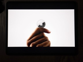 In this illustration photographed in La Habra, Calif., the AirTag tracking device is introduced during a virtual event held to announce new Apple products, Tuesday, April 20, 2021.