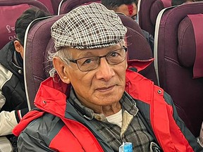French serial killer Charles Sobhraj sits in an aircraft departing from Kathmandu to France on Dec. 23, 2022.