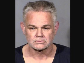 Mugshot of Eric Holland, found with human remains in stolen truck in Las Vegas.