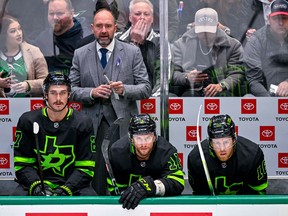 Dallas Stars head coach Peter DeBoer watches his team take on the New York Islanders during the second period at the American Airlines Center.