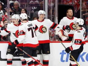 Ottawa Senators left wing Tim Stutzle (18) celebrates with teammates after scoring a goal against the Washington Capitals in the second period at Capital One Arena.