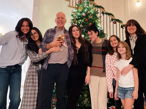 Bruce Willis posed with Emma Heming Willis, Demi Moore and his children in a rare family photo.