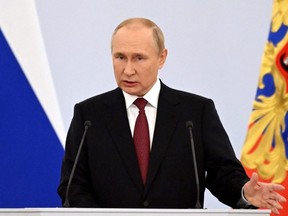 Russian President Vladimir Putin delivers a speech during a ceremony to declare the annexation of the Russian-controlled territories of four Ukraine regions, after holding what Russian authorities called referendums in the occupied areas of Ukraine that were condemned by Kyiv and governments worldwide, in the Georgievsky Hall of the Great Kremlin Palace in Moscow, Sept. 30, 2022.