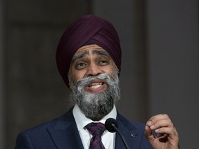 Minister of International Development Harjit Sajjan speaks during a news conference in Ottawa, Oct. 26, 2021. A Senate committee is urging the Trudeau government to amend laws that are blocking humanitarians from responding to growing desperation in Afghanistan.
