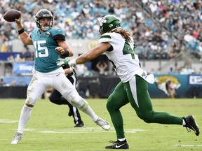 Jacksonville Jaguars quarterback Gardner Minshew looks to pass the ball during the third quarter against the New York Jets at TIAA Bank Field.