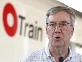 After returning from a previously planned vacation, Jim Watson read the LRT public inquiry report and issued a statement about its findings on Friday.
