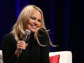 Pamela Anderson takes part in a question and answer session at the Calgary Expo on Sunday, April 28, 2019.