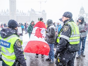 A group joined together to celebrate the one-year anniversary of the convoy protest on the weekend with two days of gatherings on Parliament Hill and surrounding area. A heavy police presence kept a watchful eye to make sure things stayed under control on Sunday, Jan. 29, 2023.