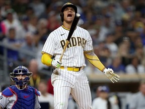 Juan Soto of the San Diego Padres reacts to a strike during the seventh inning of a game against the Los Angeles Dodgers at PETCO Park on Sept. 29, 2022 in San Diego, California.