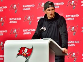 Tom Brady of the Tampa Bay Buccaneers speaks to the media after losing to the Dallas Cowboys 31-14 in the NFC Wild Card playoff game at Raymond James Stadium on January 16, 2023 in Tampa, Florida.