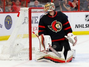 Ottawa Senators goaltender Anton Forsberg (31) looks back at the puck in his net after the Winnipeg Jets scored during the second period at the Canadian Tire Centre on Saturday, Jan. 21, 2023.