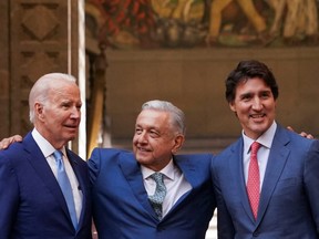 U.S. President Joe Biden, Mexican President Andres Manuel Lopez Obrador and Prime Minister Justin Trudeau pose at the conclusion of the North American Leaders' Summit in Mexico City, Mexico, Jan. 10, 2023.