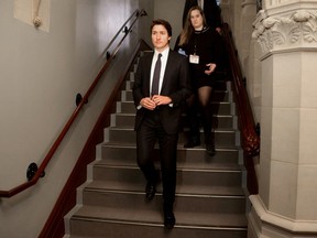 Canada's Prime Minister Justin Trudeau walks to a caucus meeting on Parliament Hill in Ottawa on Jan. 27, 2023.
