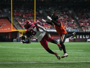 Calgary Stampeders' Richie Sindani (87) fails to hold onto the ball while attempting to make a reception in the end zone as B.C. Lions' T.J. Lee (6) defends during the second half of CFL football game in Vancouver, on Saturday, September 24, 2022. Calgary Stampeders wide receiver Richie Sindani was suspended two games by the CFL on Friday for testing positive for banned substances. The 27-year-old from Regina tested positive for Methandienone and Stanozolol, the league said in a statement.
