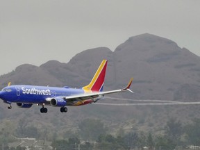 A Southwest Airlines jet arrives at Sky Harbor International Airport, Wednesday, Dec. 28, 2022, in Phoenix.