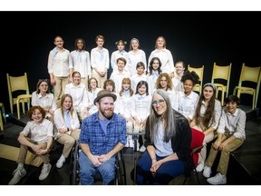 OTTAWA:  Scott Jones, left, director Jillian Keiley and a choir of local children were rehearsing for the play, I Forgive You, opening this week at the National Arts Centre. 

ASHLEY FRASER/Postmedia