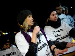 A vigil took place at the Western Ottawa Community Resource Centre (WOCRC) in honour of the National Day of Remembrance and Action on Violence Against Women Wednesday December 6, 2017. Holly Campbell an organizer with Because Wilno and a violence survivor read a poem "It Starts With Words."