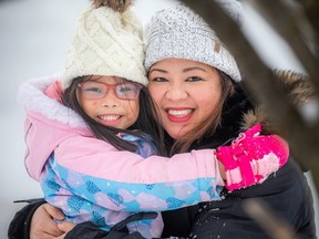 OTTAWA - Stephanie Manipol with her twin girls, six-year-old Emma (pictured with her mother) and sister Athena, Saturday, Jan. 28, 2023. 

ASHLEY FRASER/Postmedia