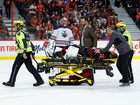 Ottawa Senators goaltender Anton Forsberg (31) is stretchered off the ice by medical personnel after being injured during third period NHL action against the Edmonton Oilers at the Canadian Tire Centre on Saturday, Feb. 11, 2023.