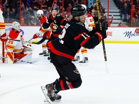 Ottawa Senators winger Alex DeBrincat celebrates a goal.